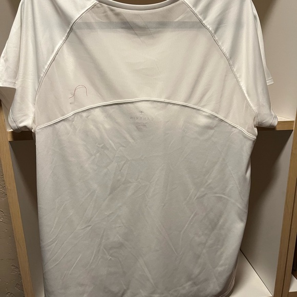 White workout top. Sheer panel on 1/4 of the back side. - Picture 3 of 3